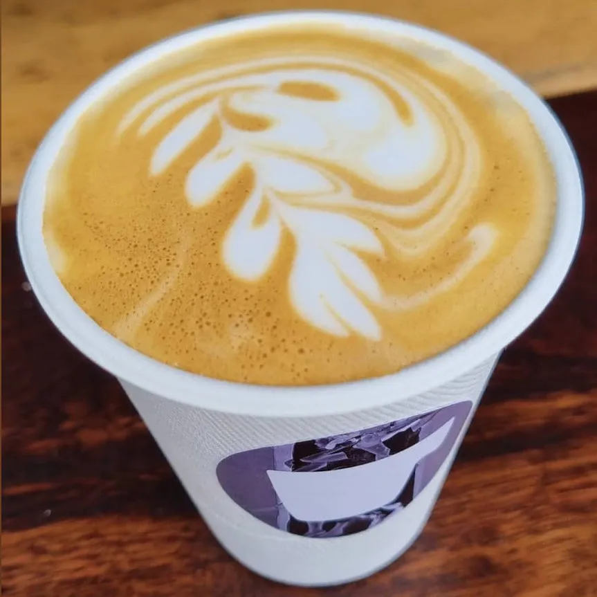 Latte en vaso öss